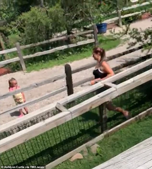 Woman Entered Alligator Pit With Son To Retrieve Wallet In Insane Video