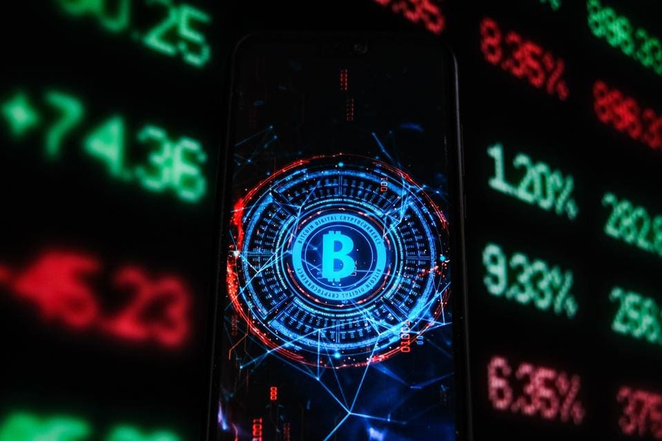 Bitcoin surges to top $60,, putting it within striking distance of all-time high