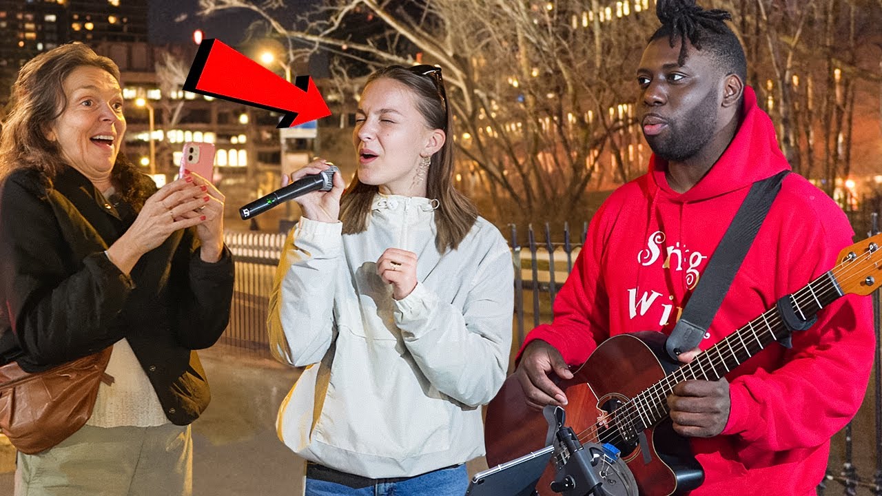 Woman busker street musician playing the | Stock Video | Pond5