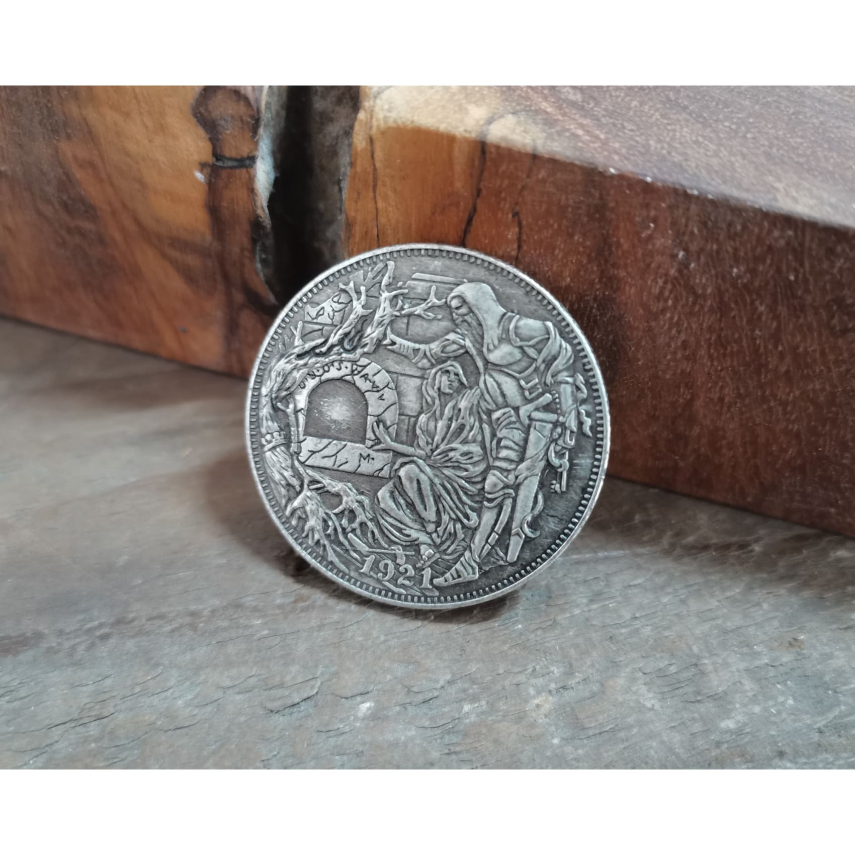 This Modified Silver Dollar has a Secret Button for Clasping the Sword » TwistedSifter