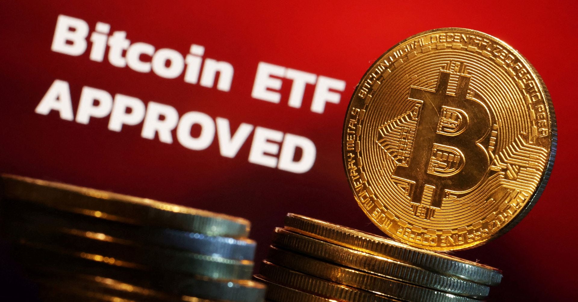 US bitcoin ETFs see $ billion in volume in first day of trading | Reuters