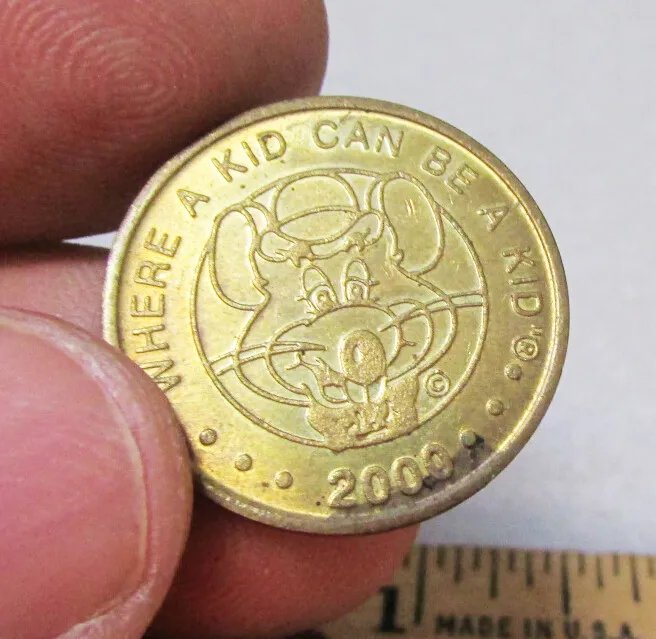 Token - Chuck E Cheese (Brass) - United States – Numista